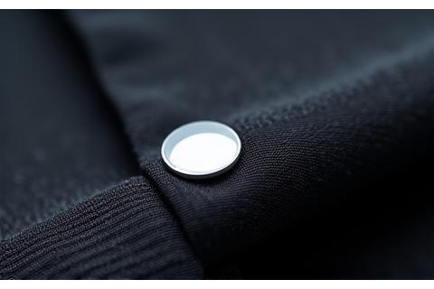 Close-up view of an integrated optical sensor in athletic fabric